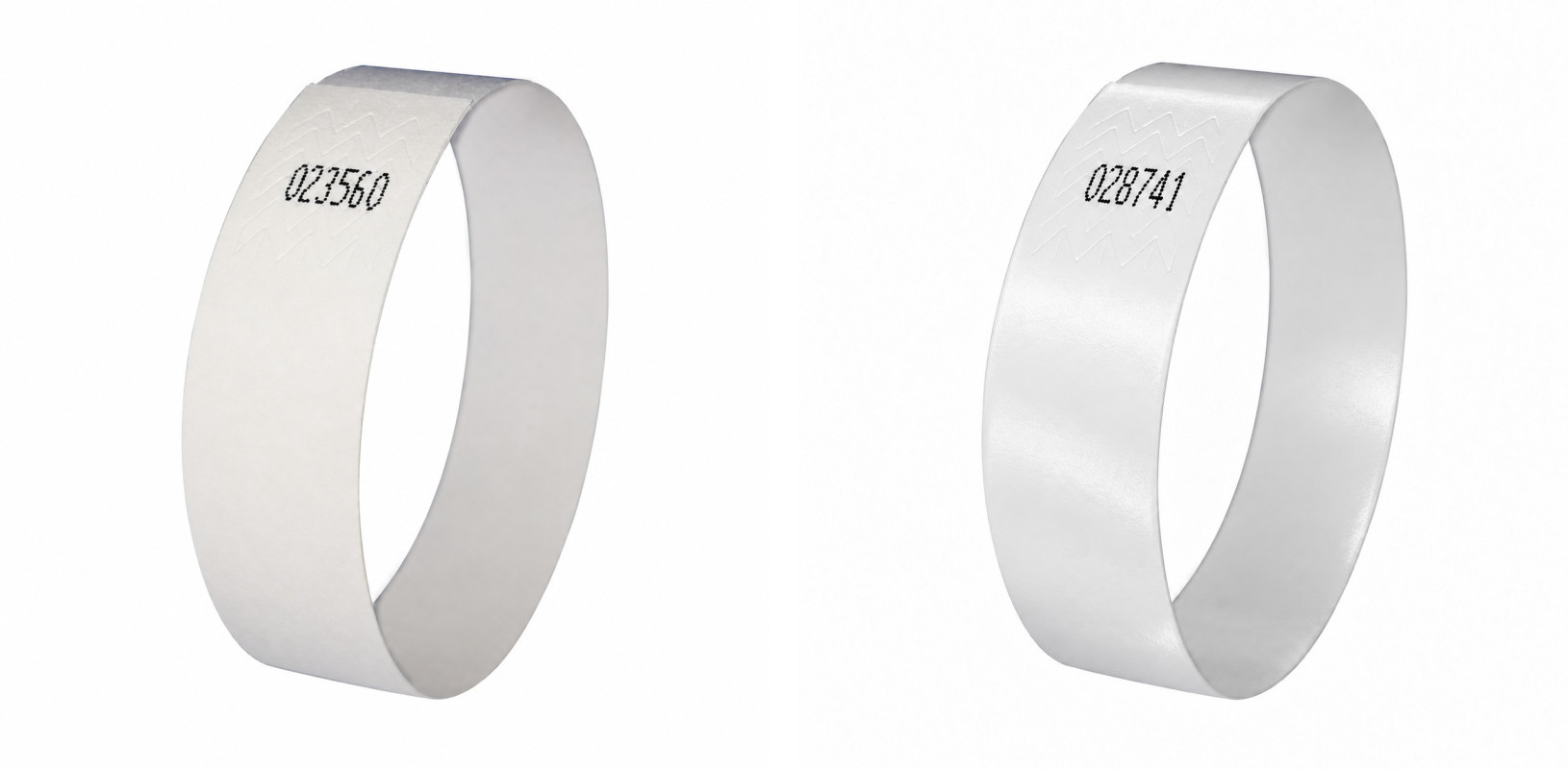 Ett matt och ett blankt armband för laserskrivare sida vid sida